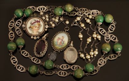 SET in silver min 800/°° including: brooch,...