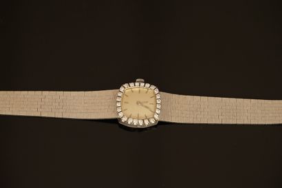 WATCH in 18K (750/°°) white gold, dial surrounded...