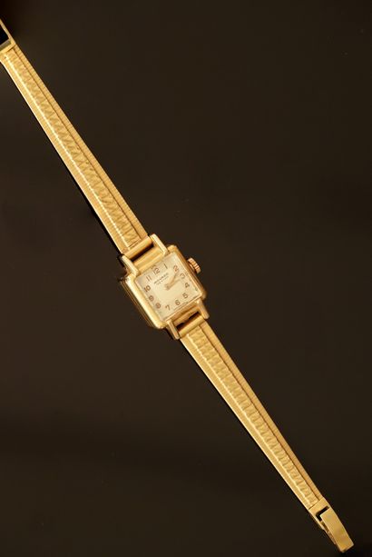 Lady's BRACELET WATCH in 18k (750/°°) yellow...
