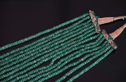 NECKLACE with 7 rows of faceted emerald pearls...