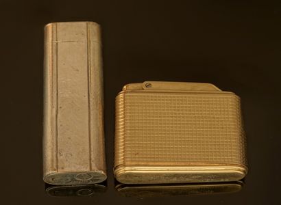 SET of 2 gas lighters: Cartier in silver...