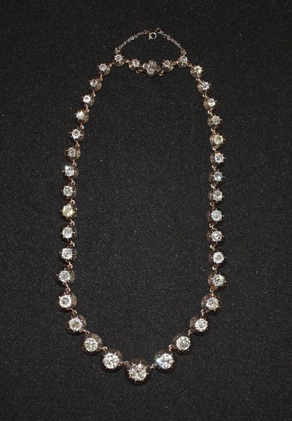 COLLIER RIVIERE en or jaune 18K (750/°°)...