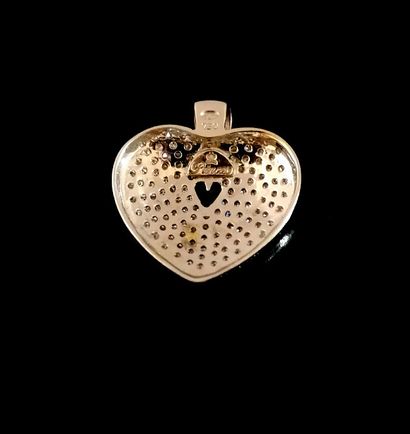 
PENDENTIF en or blanc 18K (750/°°) figurant...
