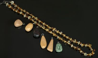 SET composed of a necklace adorned with yellow...
