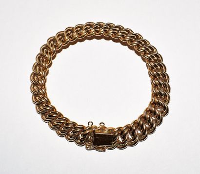 BRACELET in 18K (750/°°) yellow gold, American...