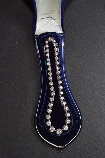 COLLIER RIVIERE en or jaune 18K (750/°°)...