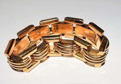 BRACELET in 18K (750/°°) yellow gold, tank...