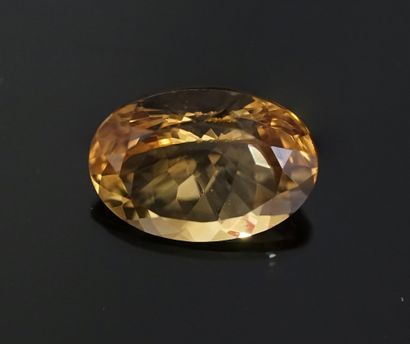 Oval faceted LEMON on paper. 12.60ct. 19x14mm...