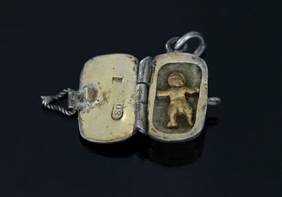 Miniature silver pendant forming a basket,...