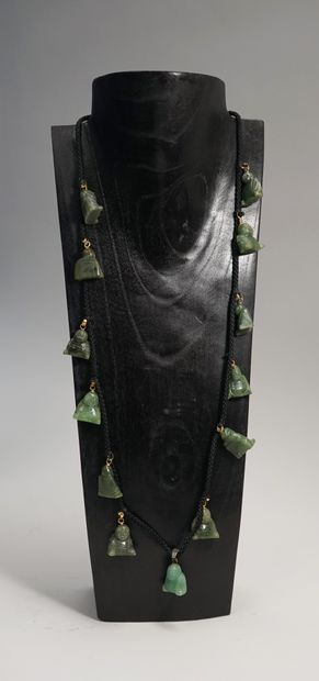 SAUTOIR in cord of passementerie, decorated...