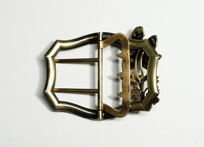 Silver belt buckle with iris design, circa...