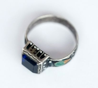 Silver ring set with a square blue glass,...