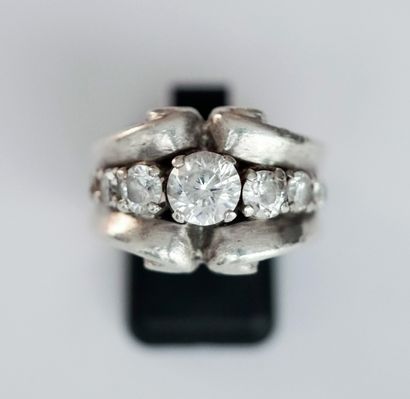 Silver roll ring set with a line of white...