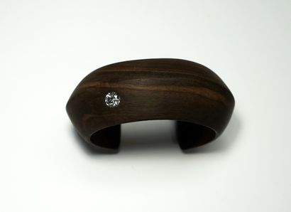 BRACELET in exotic wood set with a stone...