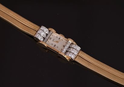 EBEL - Lady's BACELET WATCH in 18K (750/°°)...