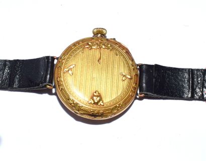 BRACELET WATCH in 18K yellow gold (750/°°),...