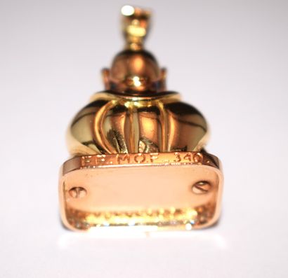 18K (750/°°) yellow gold pendant featuring...