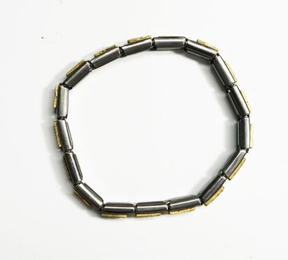 NAME - BRACELET in steel and 18K (750/°°)...