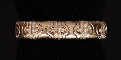 18K (750/°°) yellow gold open rigid BRACELET...