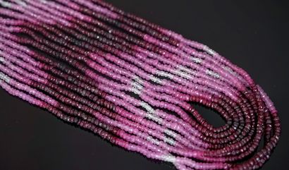 NECKLACE composed of 9 rows of faceted ruby...