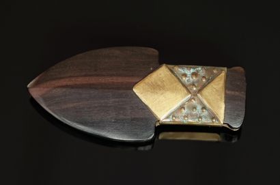 FABRICE, PARIS - An ebony and brass arrow-shaped...