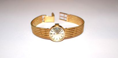LIP - WATCH BRACELET in 18K (750/°°) yellow...