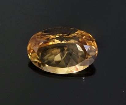 Oval faceted LEMON on paper. 12.60ct. 19x14mm...
