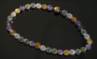 NECKLACE composed of round faceted beads...
