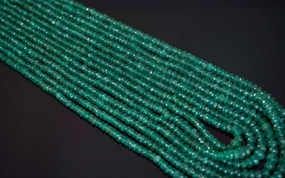 NECKLACE composed of 7 rows of small faceted...