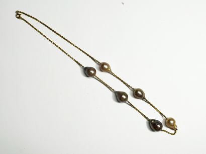 NECKLACE in 18K gold (750/°°) punctuated...