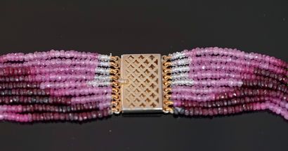 NECKLACE composed of 9 rows of faceted ruby...