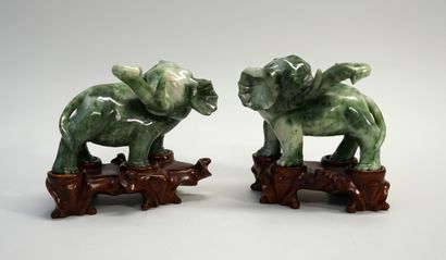 Pair of elephants in green speckled jade....