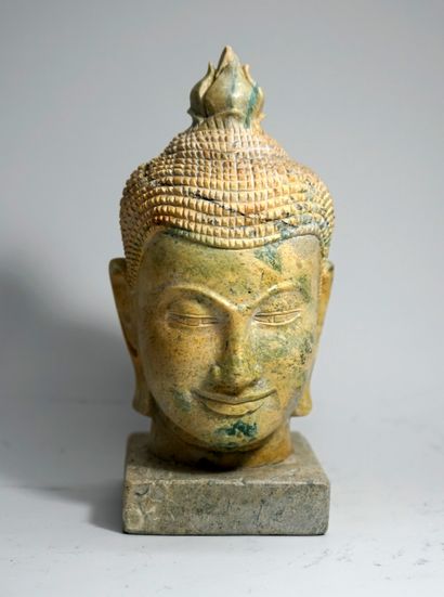 Buddha head in yellow and green stone (marble?)....