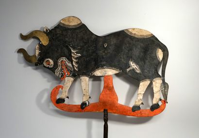 Old puppet presenting a buffalo from the...