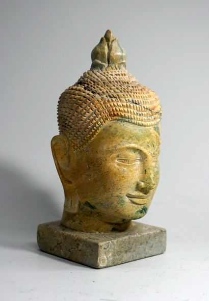 Buddha head in yellow and green stone (marble?)....