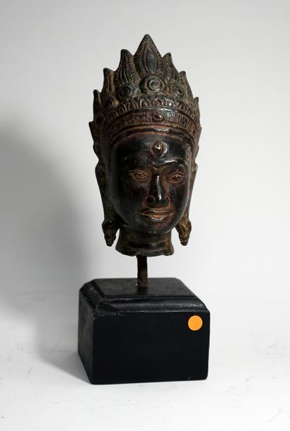 Head of crowned Apsara deity. Bronze.with...