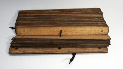 Old folding Lontar (book) whose pages are...