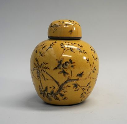 Ceramic covered pot of ovoid form with plum...
