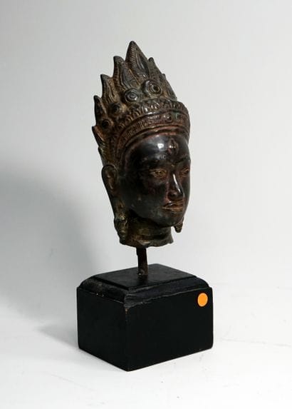 Head of crowned Apsara deity. Bronze.with...