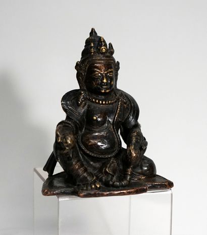 Kubera, Tibetan god of wealth with his mongoose,...