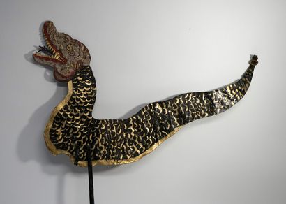 Old puppet presenting the black Naga from...