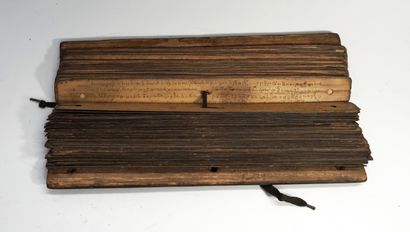 Old folding Lontar (book) whose pages are...