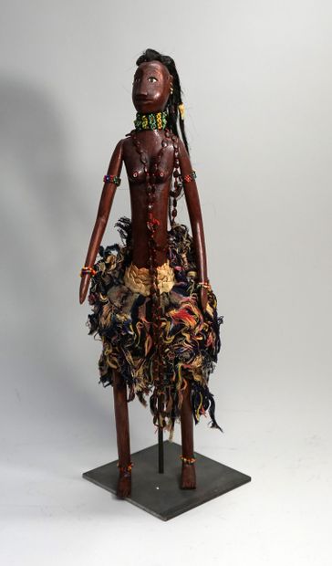 Female puppet. She wears a loincloth and...