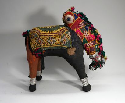 Puppet theater accessory presenting a zebu...