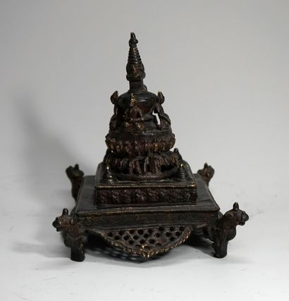 Stupa decorated with deities and dragons....