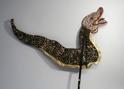 Old puppet presenting the black Naga from...
