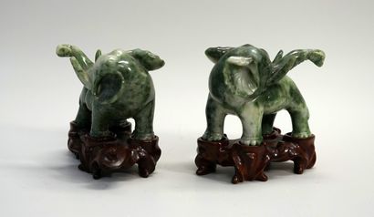 Pair of elephants in green speckled jade....