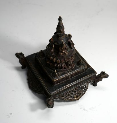 Stupa decorated with deities and dragons....