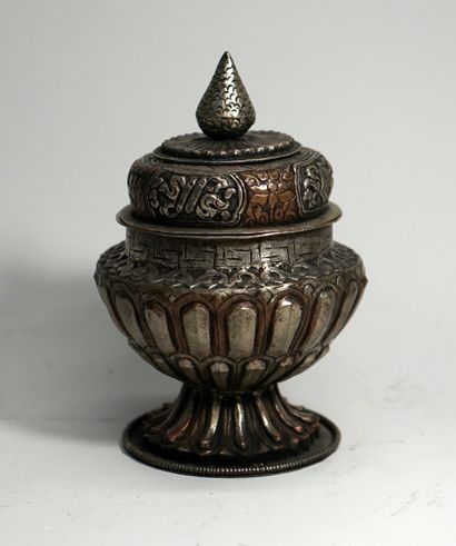 Offering container on pedestal, with lotiform...