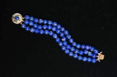 BRACELET composed of 3 rows of lapis lazuli...